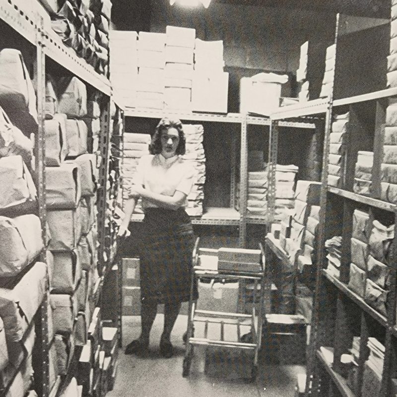 1957 employee working on logistic fulfillment services for Ernest Ready-Made Warehouse